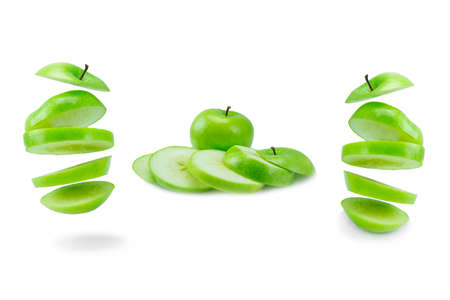 Collection sliced and stack of green apple isolated on a white background.の写真素材