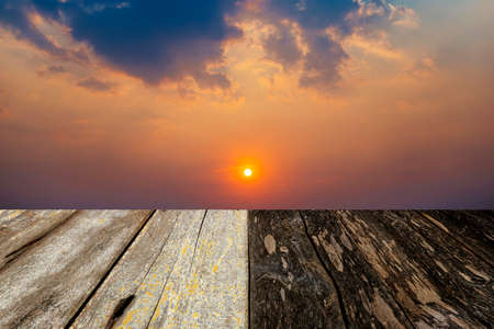 wood floor with sunset background.の写真素材