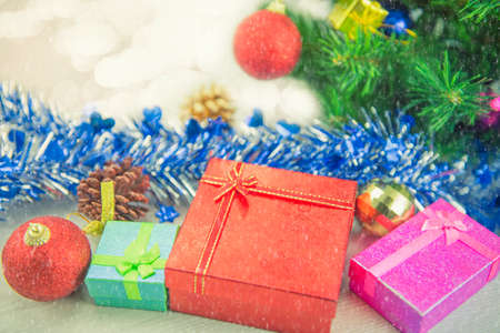 Christmas present gift boxes on wood floor. Merry Christmas and Happy New Year.の写真素材