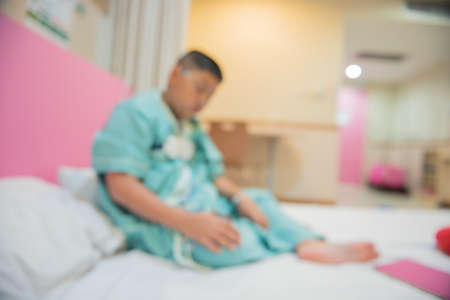 Blur Focus of Asian boy wearing Sleep Apnea Diagnostic medical device Kit. Sleep Lab Test.の写真素材