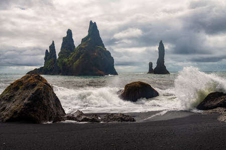 Basalt rock formations Troll toes on black beach. Reynisdrangar, Vik, Icelandの写真素材