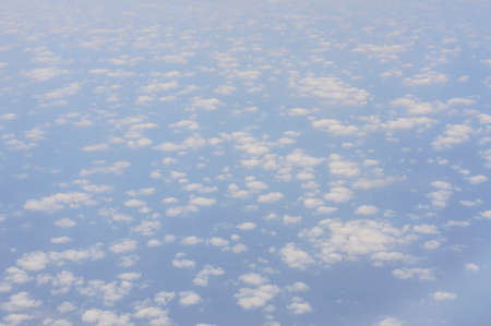 Blank sky surface with small clouds