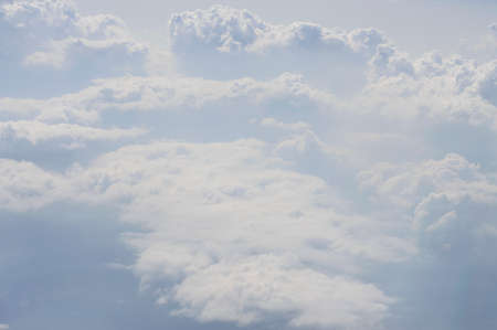 Blank sky surface with small cloudsの写真素材