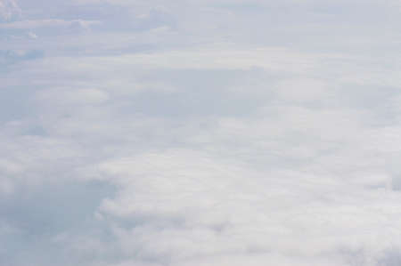 Blank sky surface with small cloudsの写真素材