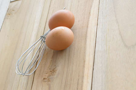 eggs on wood backgroundの写真素材