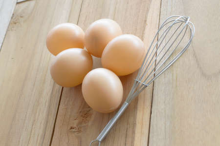 eggs on wood backgroundの写真素材