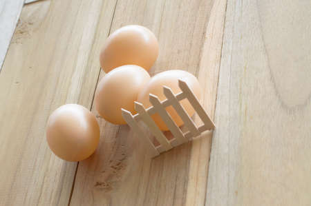 eggs on wood backgroundの写真素材