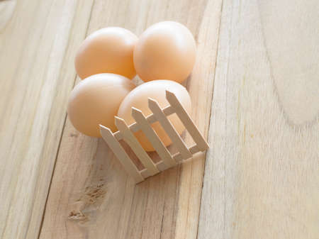 eggs on wood backgroundの写真素材