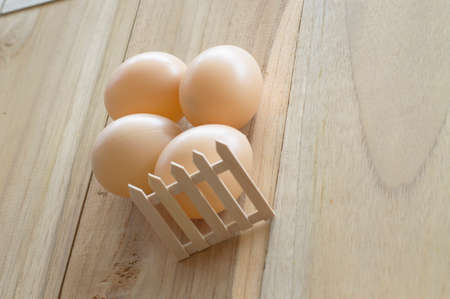 eggs on wood backgroundの写真素材