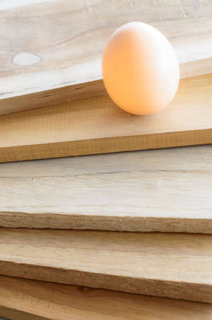 eggs on wood backgroundの写真素材