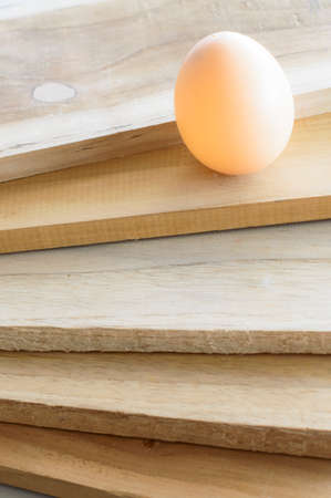 eggs on wood backgroundの写真素材