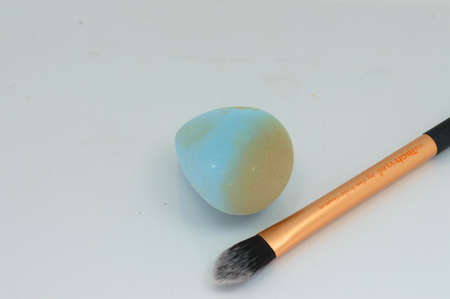Professional make-up brush and sponge with foundationの写真素材