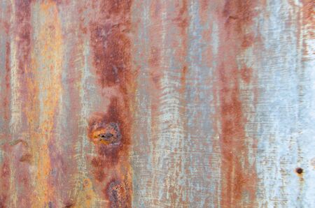 An old rust galvanized iron wall textureの写真素材