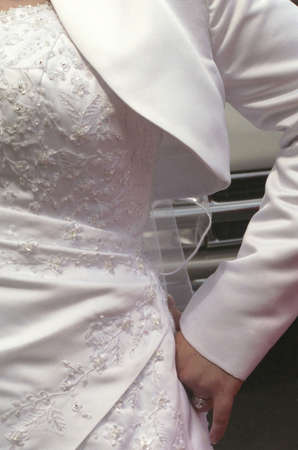 Bridal Attitude in front of car grillの写真素材