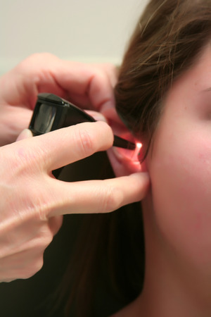 Checking the Patients Earsの写真素材