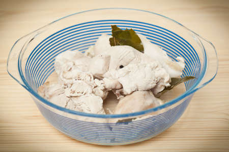 boiled chicken in a dishの写真素材