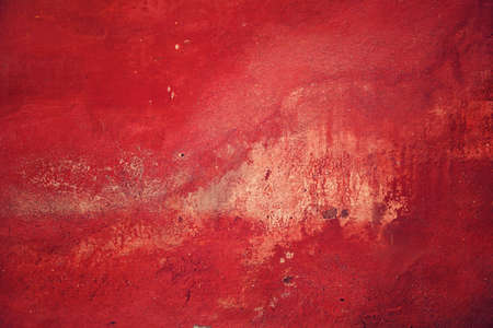 Dirty old cement wall, colored red, For texture and background.の写真素材