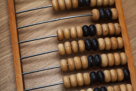 Vintage wooden abacus on the tableの写真素材