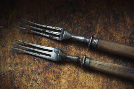 Old forks with wooden handles. Vintage objectsの写真素材