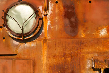Texture of rusty metal sheet. Old red metal background. Empty spaceの写真素材