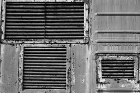 Ventilation grilles, old metal texture. The background of metal wallの写真素材