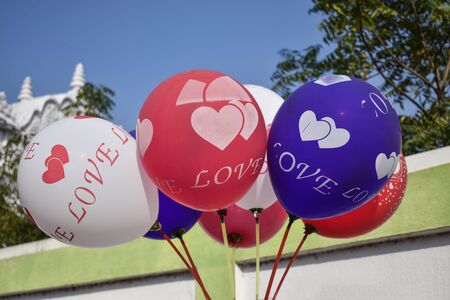 Image of some colorful balloons, Symbol of loveの写真素材