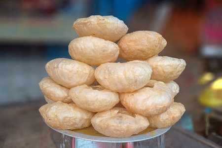 The image of an Indian deep-fried pastry is locally known as the Khaja. It's a popular sweet dish of Odisha, Andhra Pradesh, Bihar, Jharkhand, and Nepalの写真素材