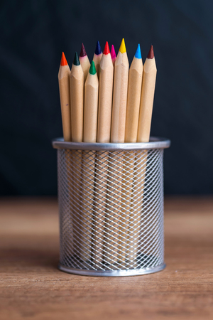 Crayons in the metal holderの写真素材