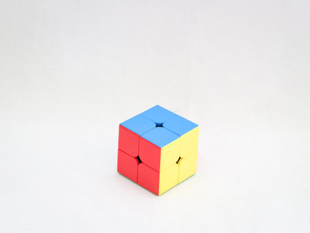 puzzle cubes and pyramid which helps to increase problem solving ability  isolated in a white backgroundのeditorial素材
