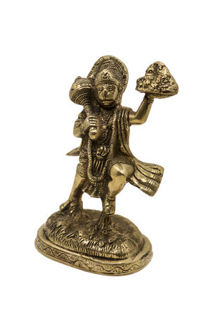 antique handcrafted statue of lord hanuman carrying a mountain according to hindu scripture ramayan isolated in a white backgroundの写真素材