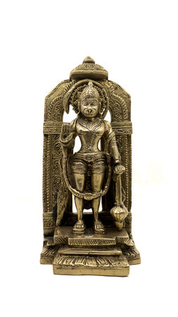 antique golden brass idol of monkey god lord hanuman blessing isolated in a white backgroundの写真素材