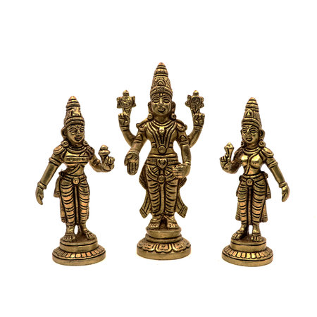 handcrafted antique figure of god vishnu of hindu religion with devi or angels of heaven isolated in a white backgroudの写真素材