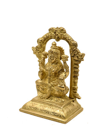 shiny gold statue of goddess lakshmi worshipped in hindu religion from a jewellery store isolatedの写真素材