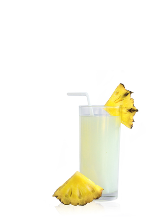 Pineapple juise and pineapple slice on white backgroundの写真素材