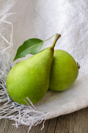 Healthy organic green pears on. Close up photo.の写真素材