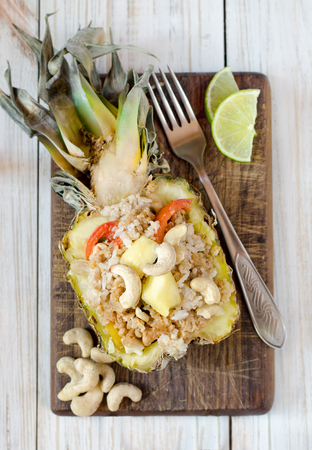 Fried rice with chicken and cashew in pineapple.の写真素材