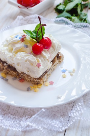 Sweet dessert with cream, bannanas and condensed milk.の写真素材