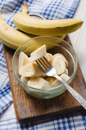 Sliced fresh banana in a glass bowl. Close up.の写真素材