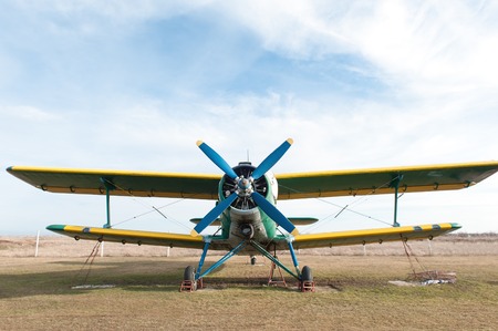 Small green airplane. Propeller close up photo.の写真素材