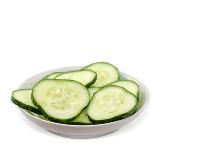 Fresh cucumber slices on a white background.の写真素材