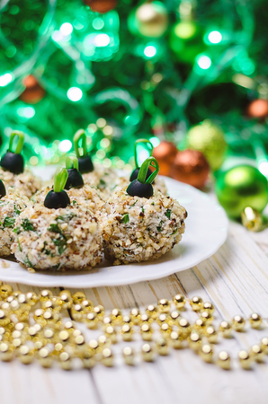 Chicken balls with philadelphia cheese and parsley, decorated like christmas balls. Christmas food.の写真素材