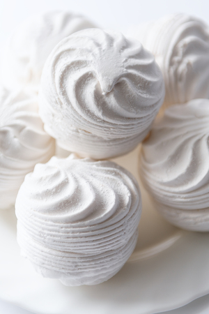 Sweet dessert white zephyr marshmallows close up.の写真素材