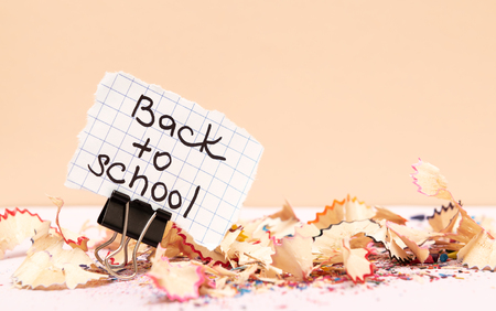 Back to school inscription on paper and pencil shavings.の写真素材