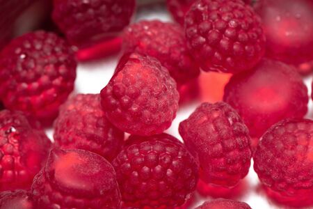 Red candy canes sweets in tin boxの写真素材