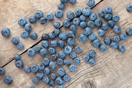 Fresh Blueberry on wooden background, close up.の写真素材
