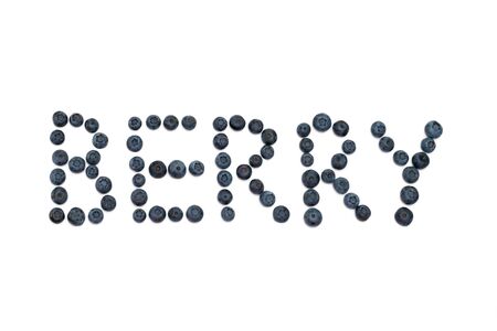 The word Berry created with blueberries on white backgroundの写真素材