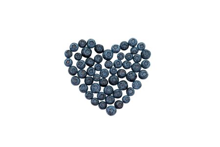 Fresh Blueberry on white background, heart shapeの写真素材