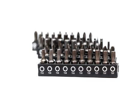 Set of heads for screwdriver on white background