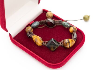 Handmade Bracelet made of stones on white background.の写真素材