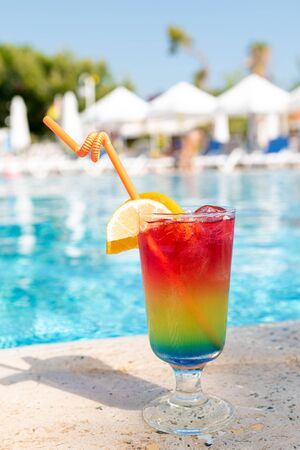 Refreshing coctail near swimming pool, tclose up.の写真素材